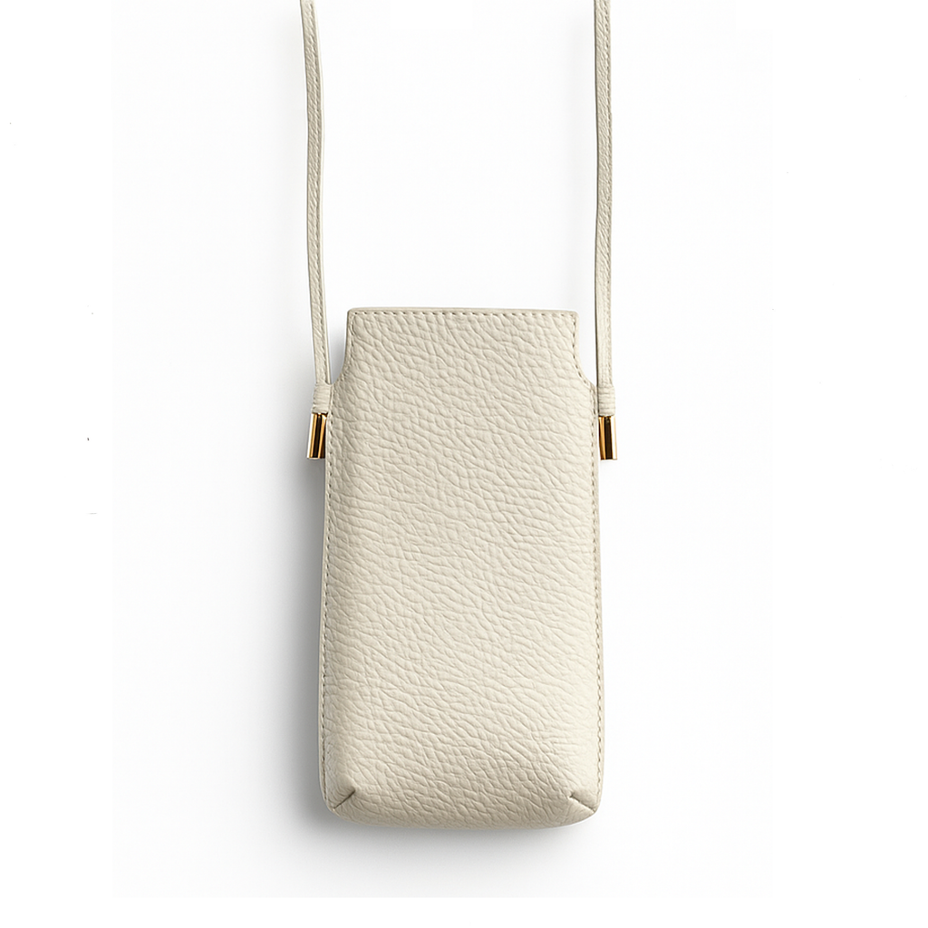 Pochette téléphone en cuir avec poche cartes. Bandoulière pratique pour garder l’essentiel à portée de main. Fabrication artisanale française.